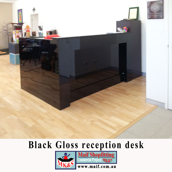 Black gloss reception counter